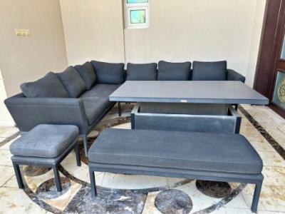 Outdoor seating with convertible table