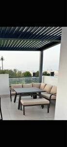 Outdoor Furniture set with sofa, table and bench